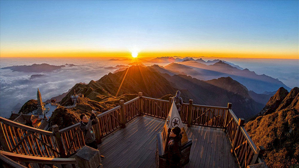 The breathtaking moment of sunrise at the summit of Mount Fansipan